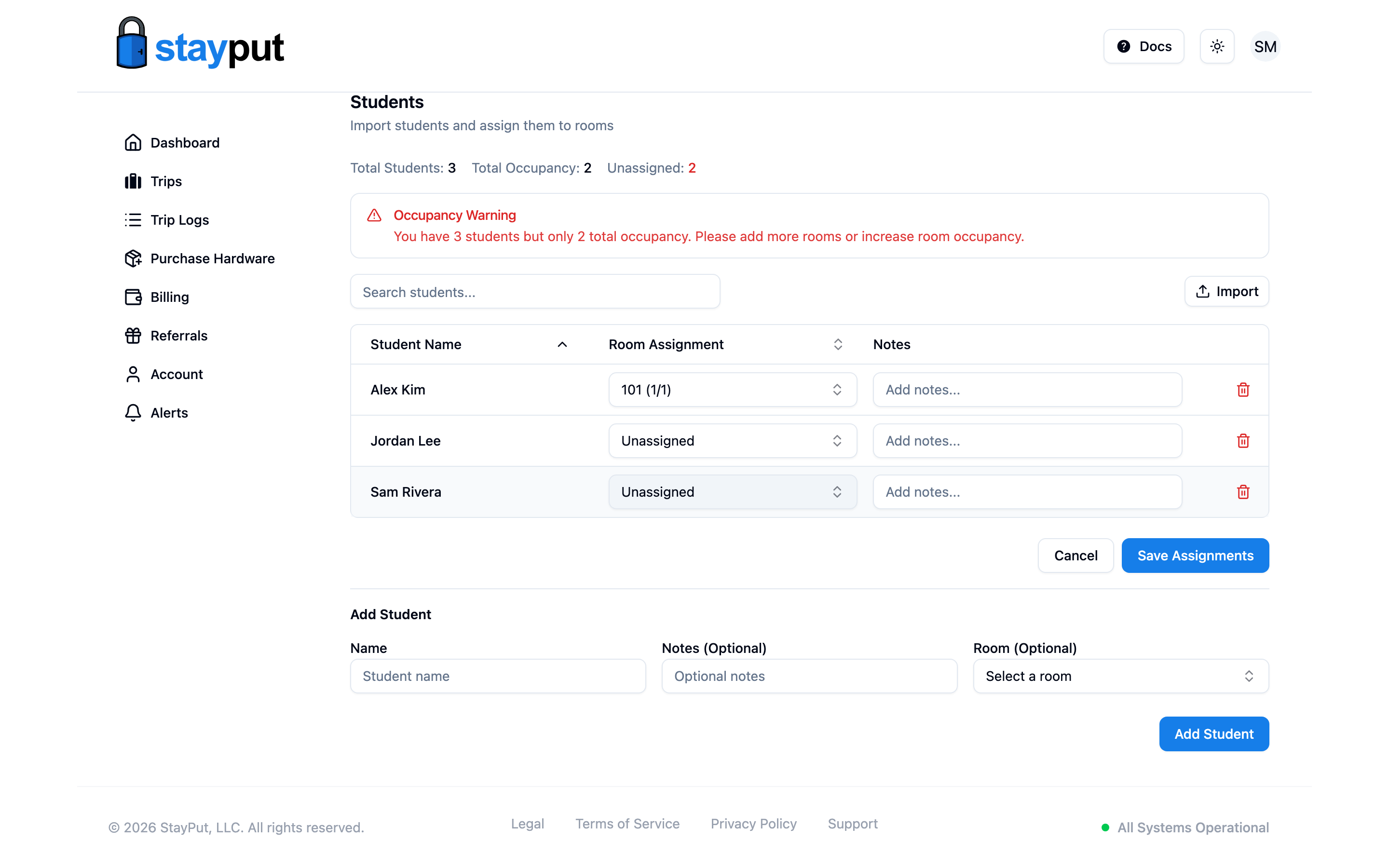 The Students tab with imported students and a room assignment dropdown (desktop)